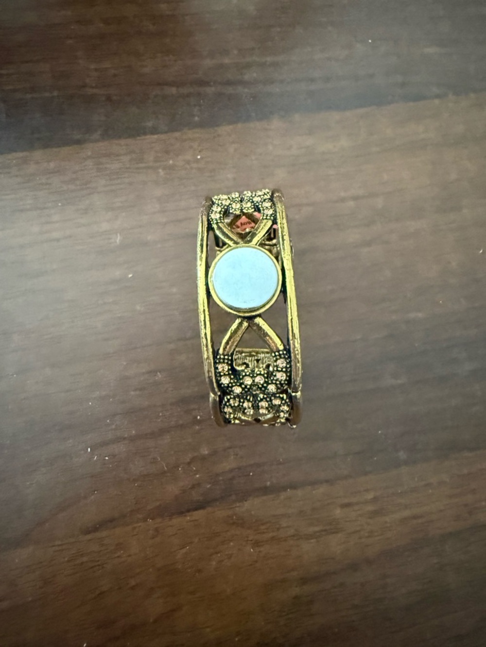 Gold-Tone Filigree Bangle Bracelet with Light Blue Accent
